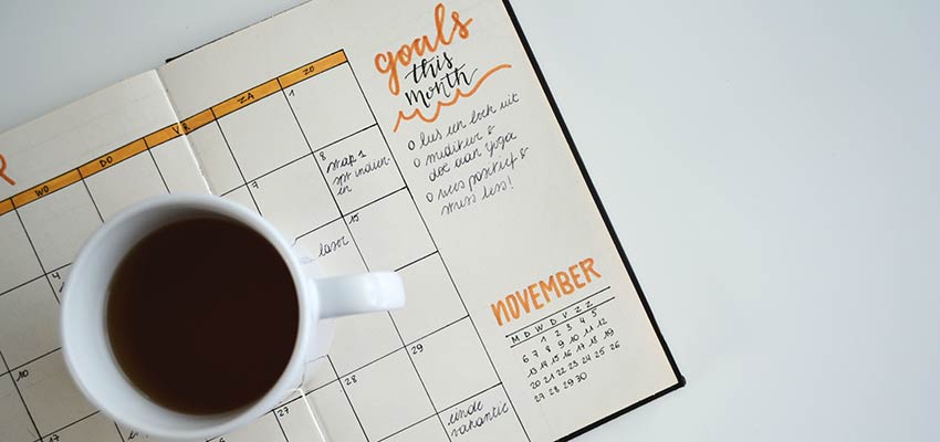 Freelance Design - Desk calendar and coffee cup.